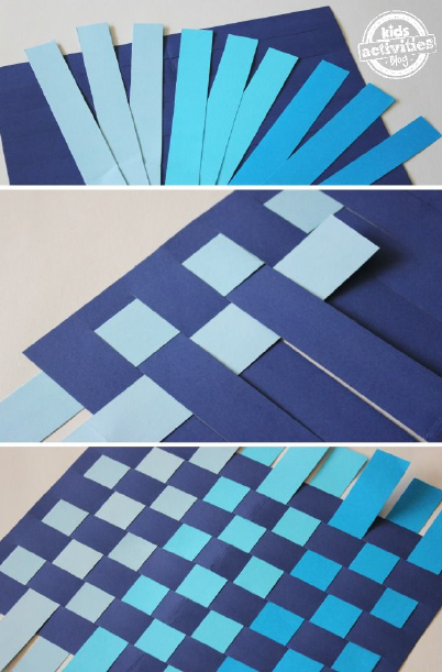 Paper weaving project with shades of blue strips of construction paper.