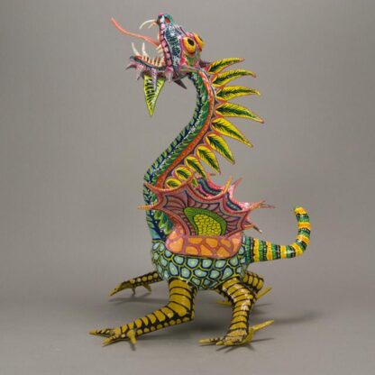 A colorful paper mache alebrije (fantasy animal) figure
